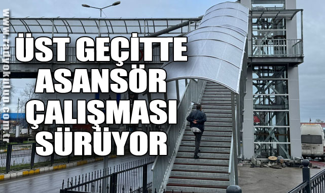 Üst geçitte asansör çalışması sürüyor.